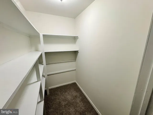 a room with storage and utility