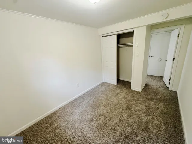 an empty room with closet