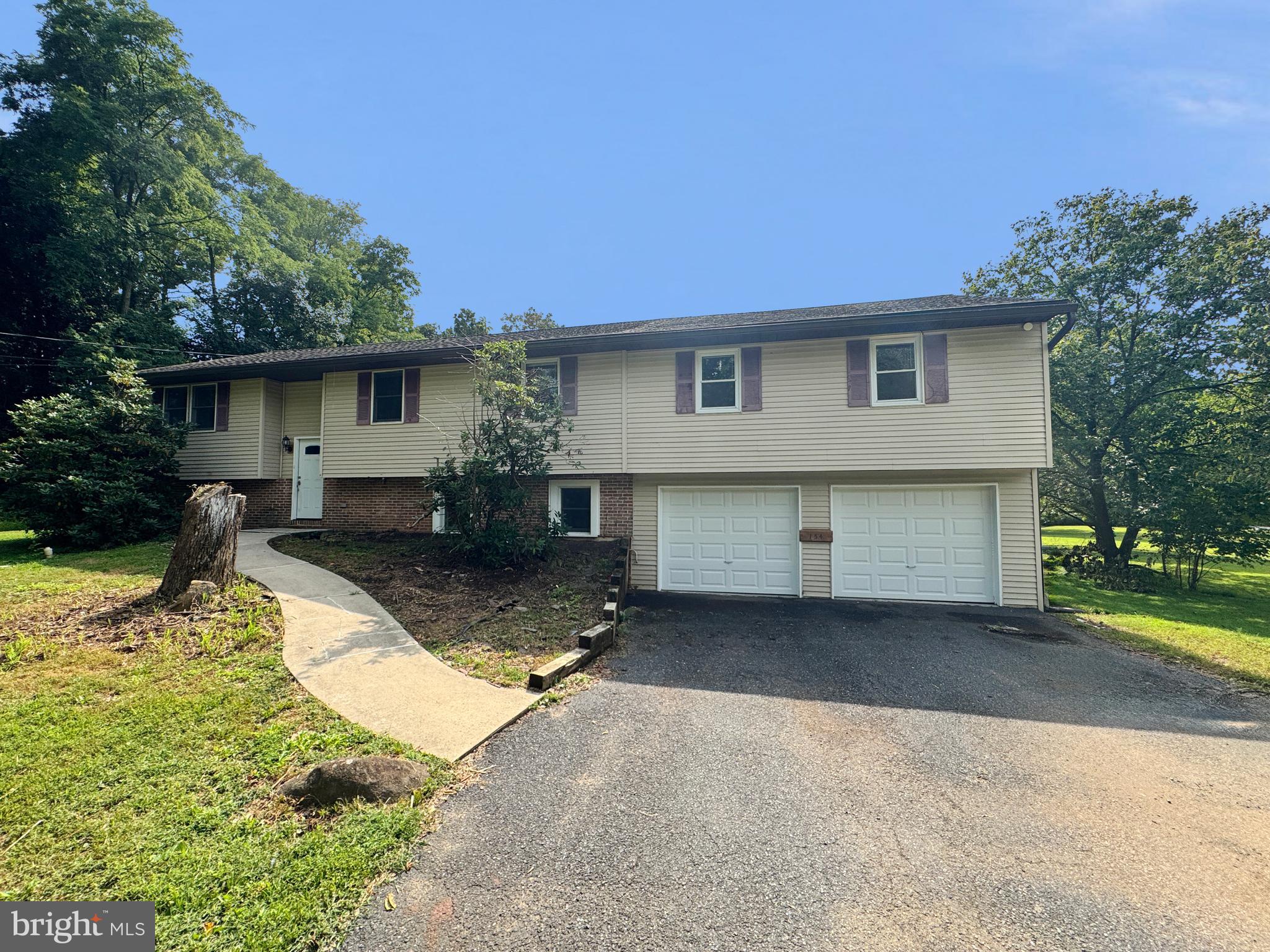 154 Niantic Road Barto, PA 19504 - Photo 33 of 33 a front view of a house with a yard and garage