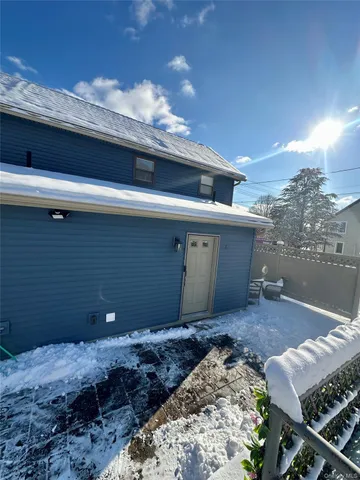 a view of a backyard of a house