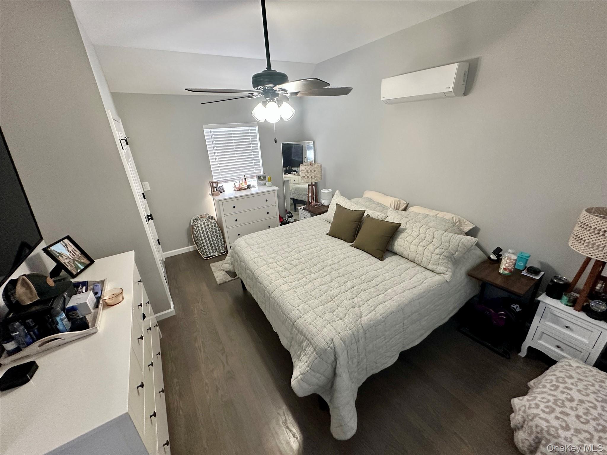 1101 Route 17 Southfields, NY 10975 - Photo 3 of 26 a bedroom with a bed and wooden floor