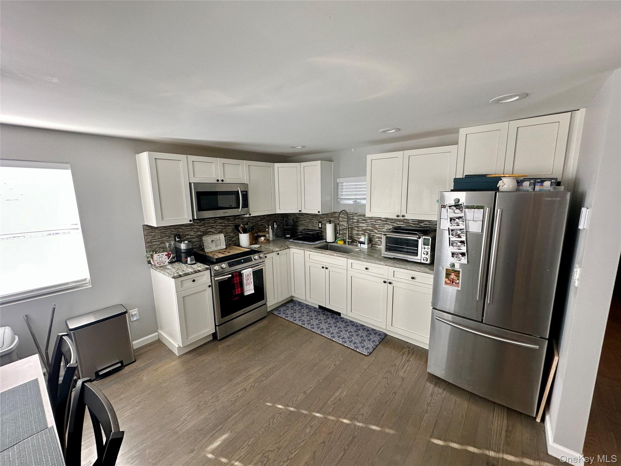 1101 Route 17 Southfields, NY 10975 - Photo 5 of 26 a kitchen with stainless steel appliances a refrigerator sink and microwave