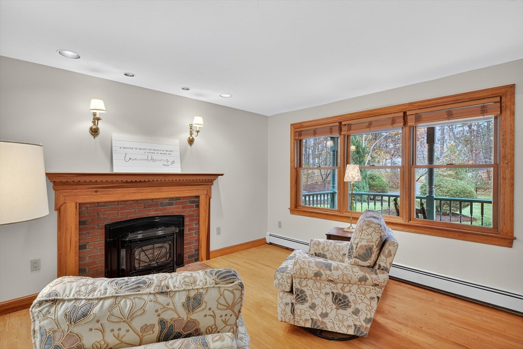 55 Sheffield Road Boxford, MA 01921 - Photo 17 of 42 a living room with furniture and a fireplace