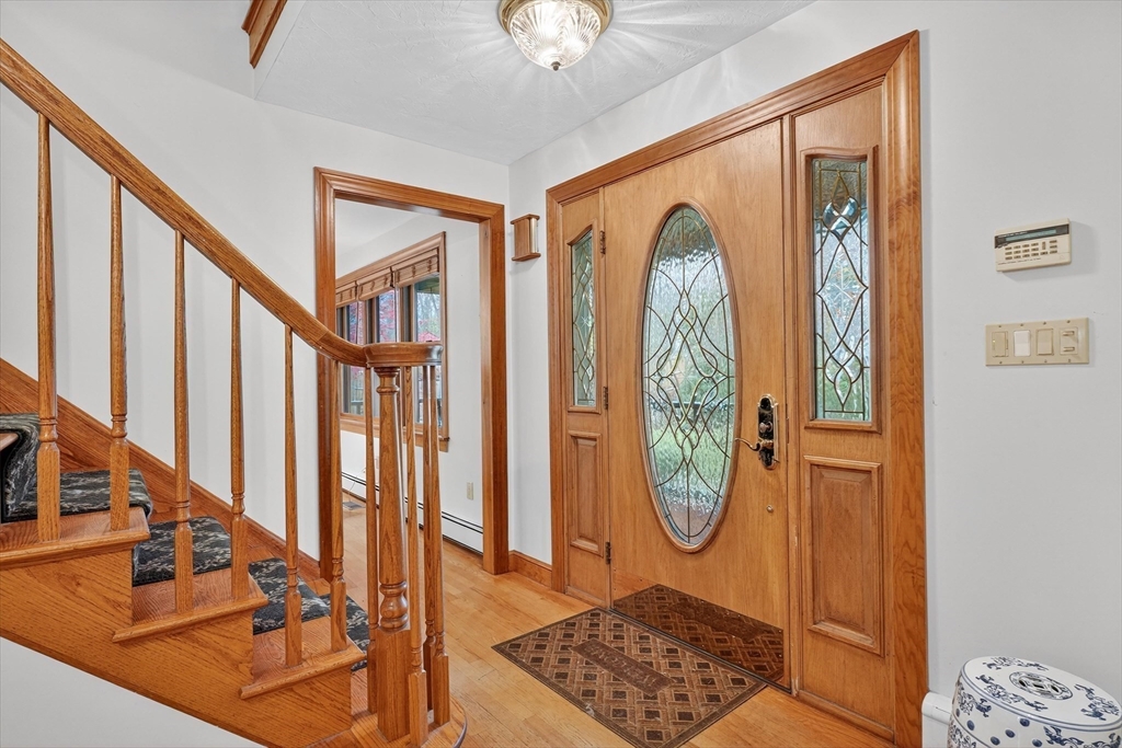 55 Sheffield Road Boxford, MA 01921 - Photo 19 of 42 a front view of a house with wooden floor and windows