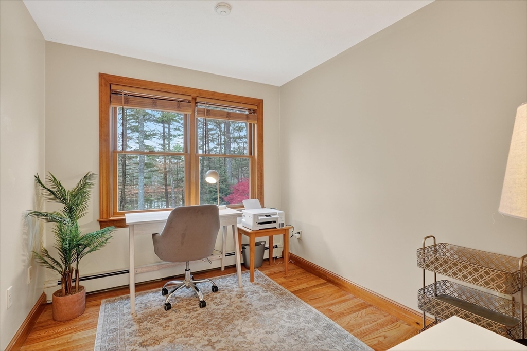 55 Sheffield Road Boxford, MA 01921 - Photo 20 of 42 a workspace with furniture and a window