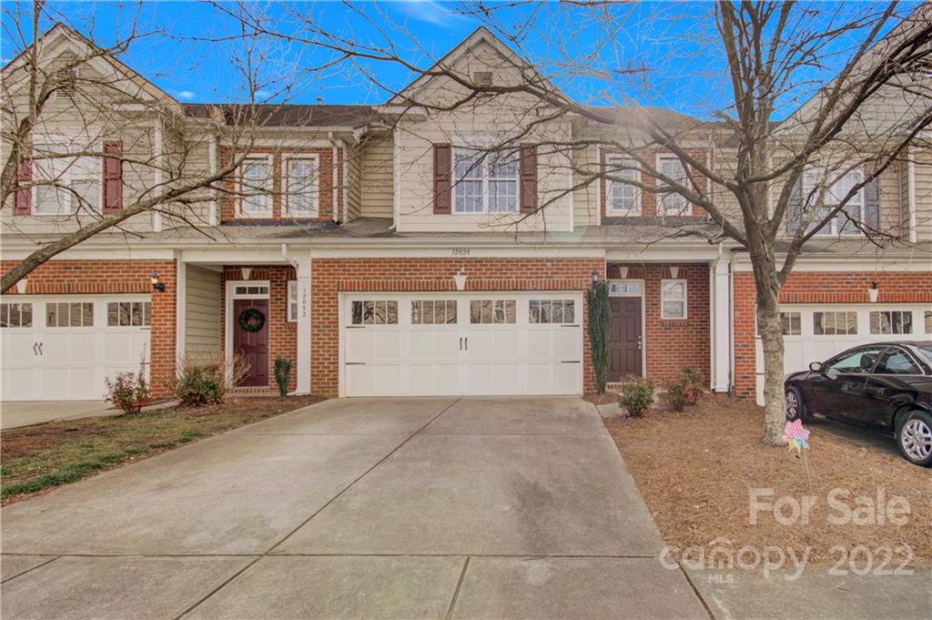 12028 Red Rust Lane Charlotte, NC 28277 - Photo 39 of 39 a view of a white house with a large windows
