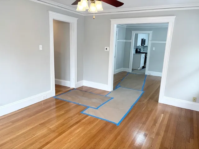 wooden floor in a hall with an entryway