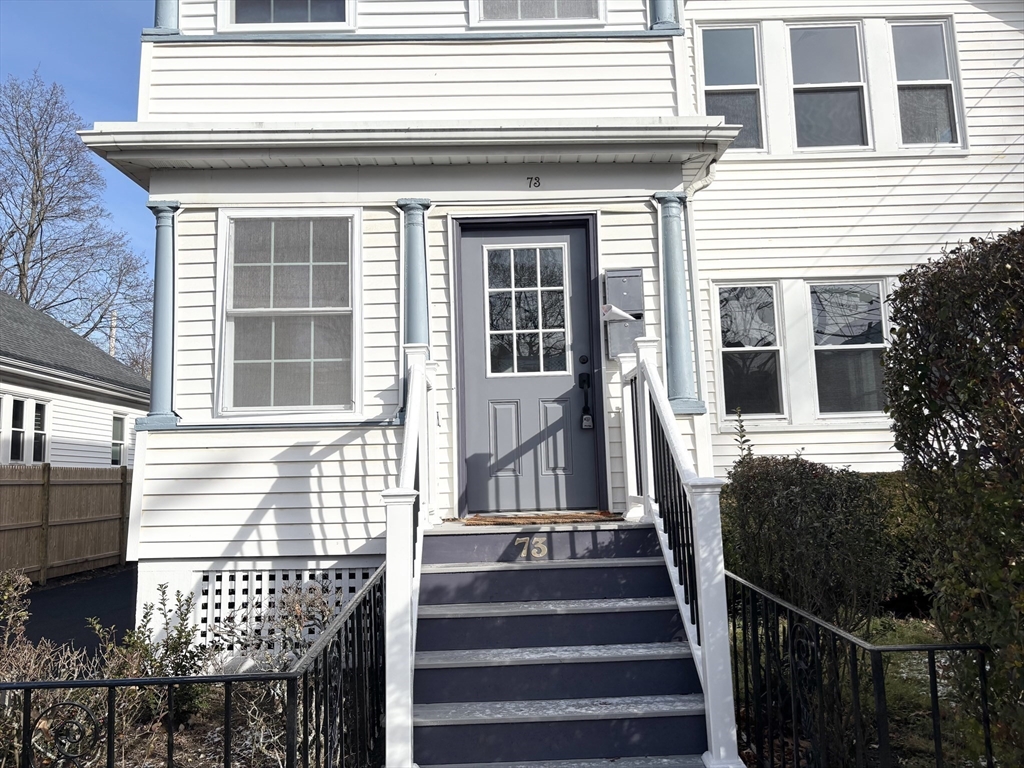 73 Dent Street, Unit 2 Boston, MA 02132 - Photo 3 of 41 a front view of a house with a window