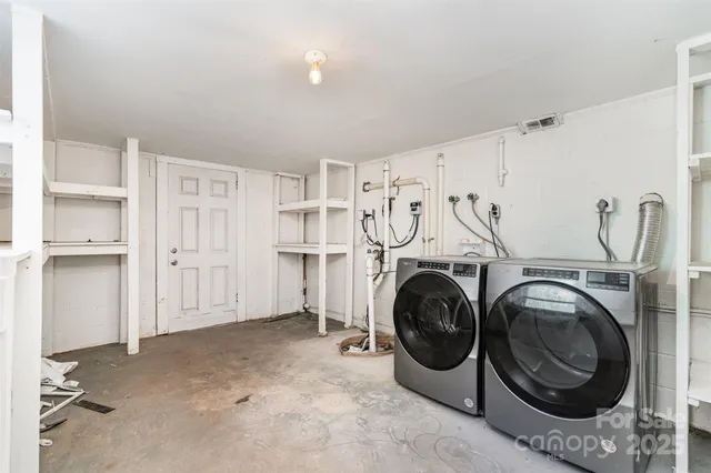 a view of a hallway with stairs
