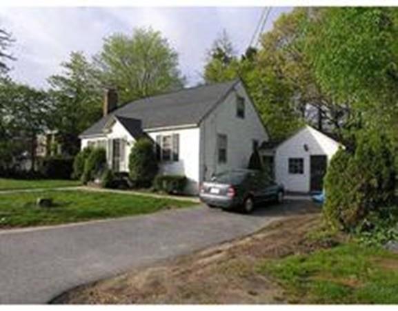 201 Turnpike Street North Andover, MA 01845 - Photo 2 of 20 a view of a house with a yard and large trees