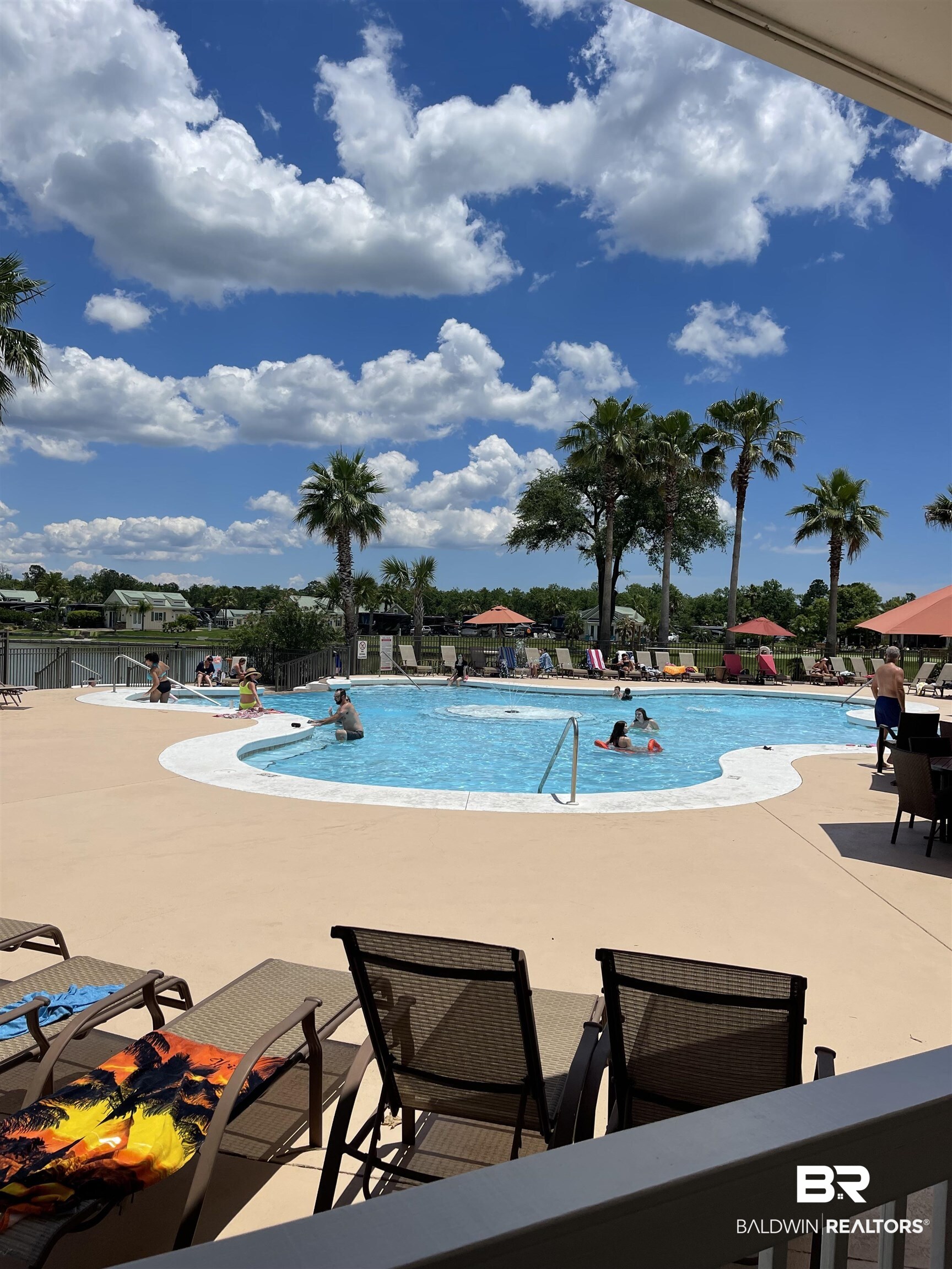 28114 Preserve Trail, Unit 190 Elberta, AL 36530 - Photo 45 of 69 Community pool featuring a patio area