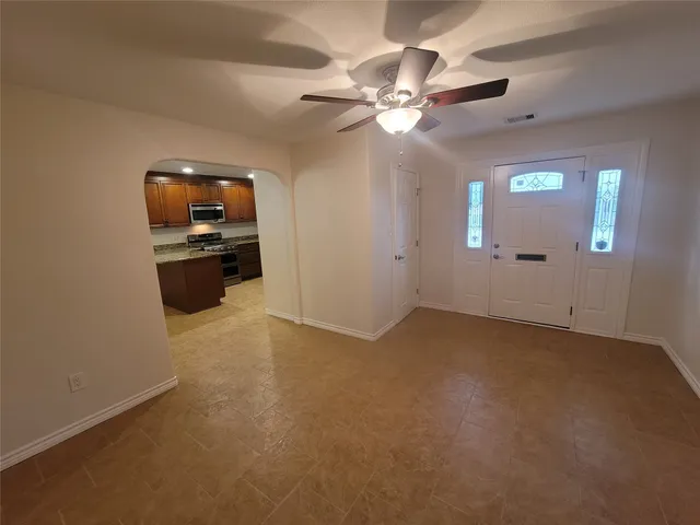 a view of a livingroom with a flat screen tv