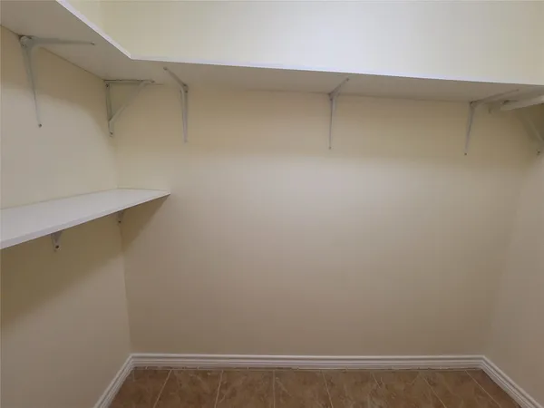 a view of small space with racks on the wall