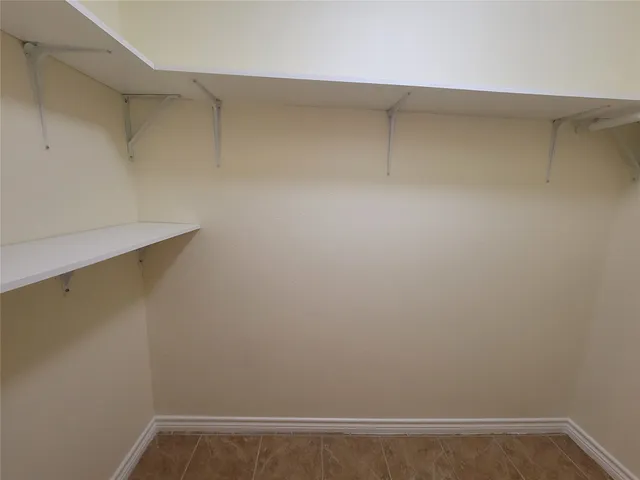 a view of small space with racks on the wall