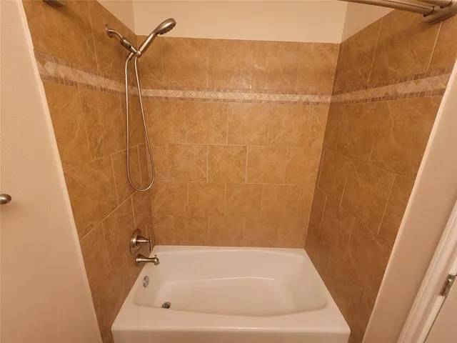 a bathroom with a bathtub