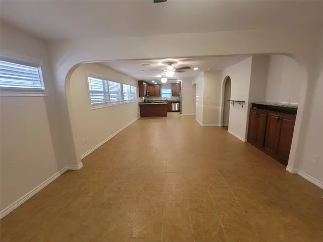 a view of a room with entryway and stairs