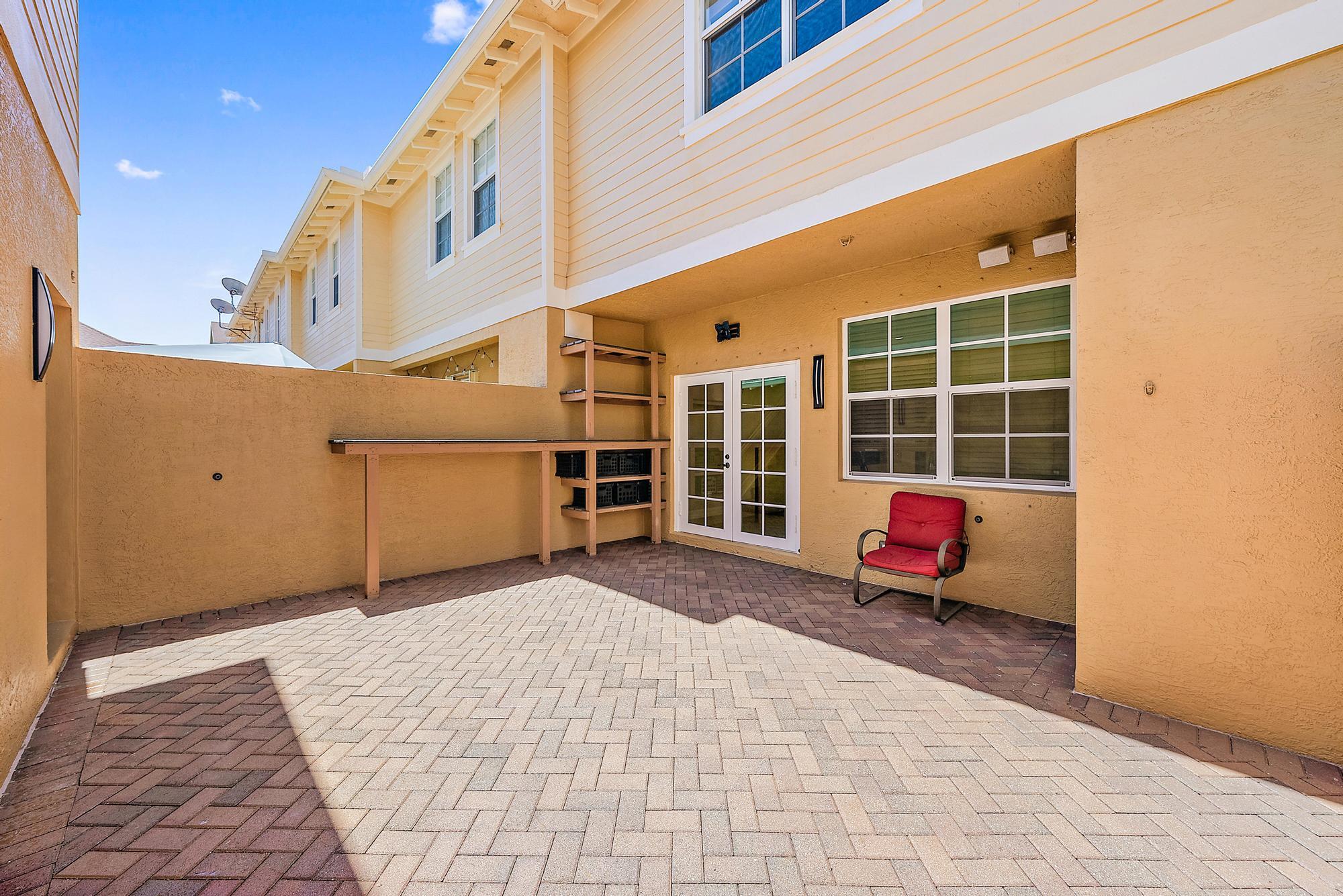 203 East Bay Cedar Circle Jupiter, FL 33458 - Photo 13 of 64 a view of a large building