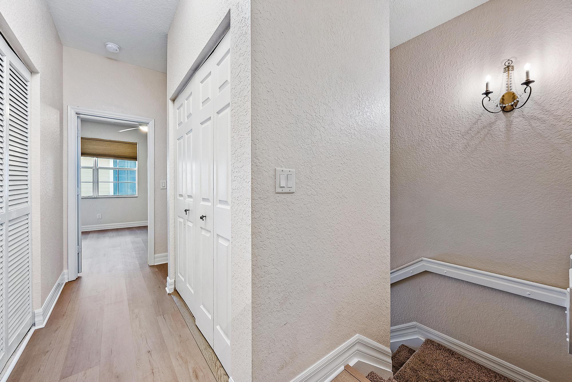 203 East Bay Cedar Circle Jupiter, FL 33458 - Photo 19 of 64 2nd FL Hallway