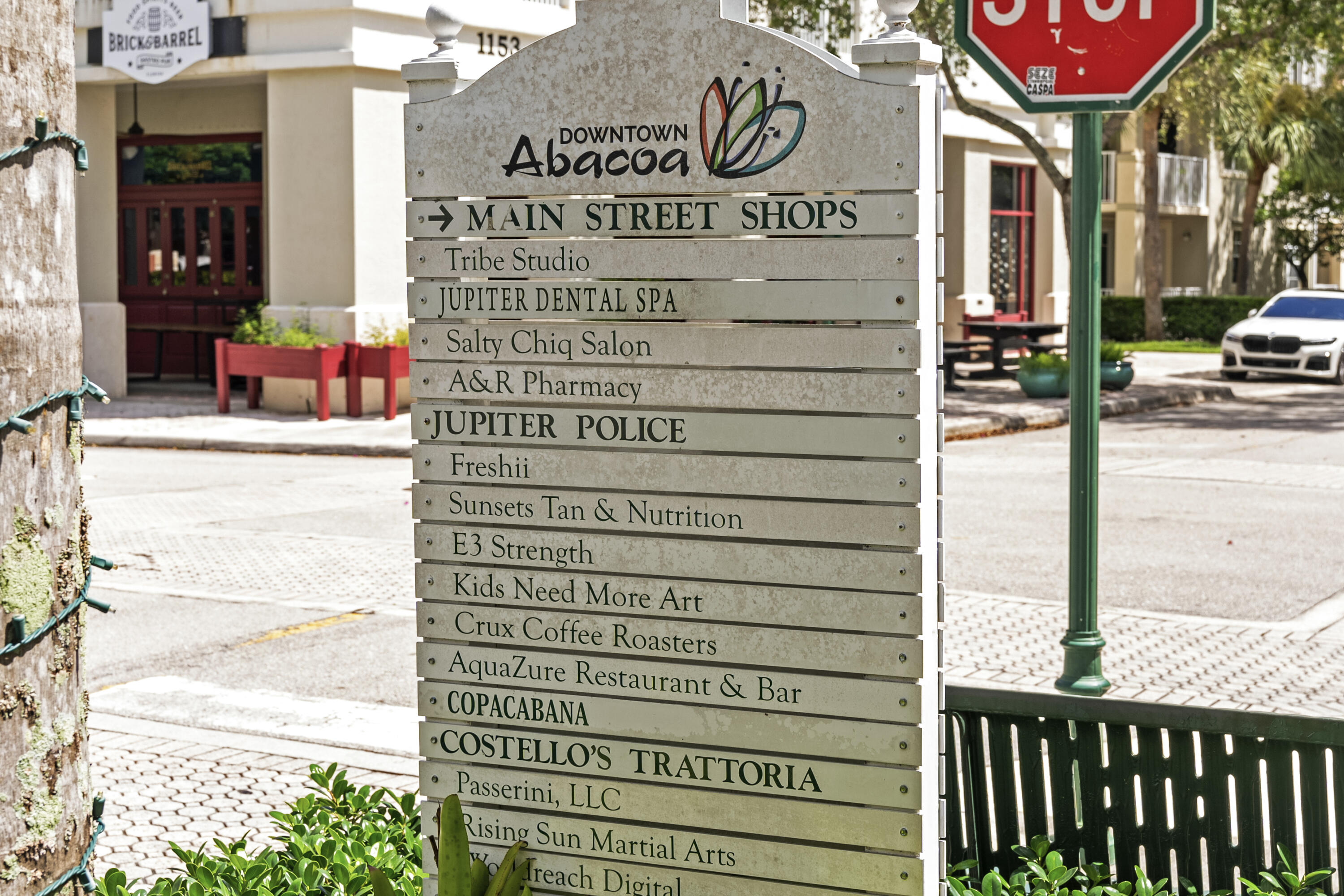 203 East Bay Cedar Circle Jupiter, FL 33458 - Photo 60 of 64 a view of a building with a street