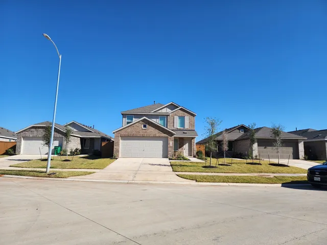 a view of a house with a swimming pool