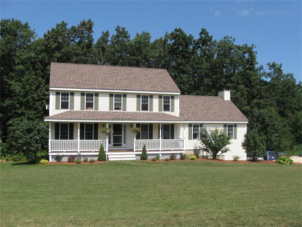 26 Thurston Hill Road Rutland, MA 01543 - Photo 1 of 1 a front view of a house with a yard table and chairs
