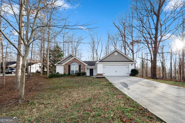 front view of a house with a yard
