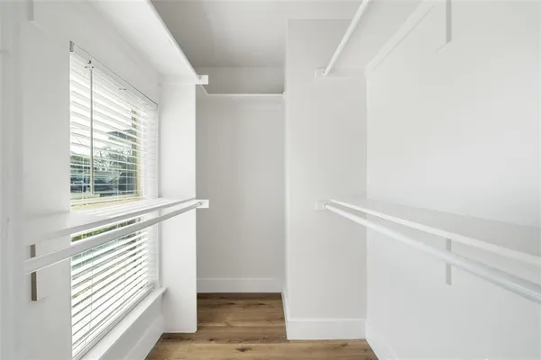 a view of front door with wooden floor