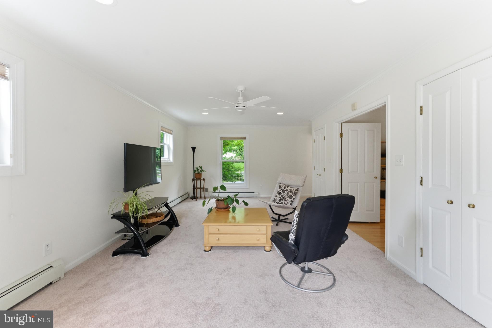 2100 Edgewater Parkway Silver Spring, MD 20903 - Photo 17 of 46 a living room with furniture and a flat screen tv