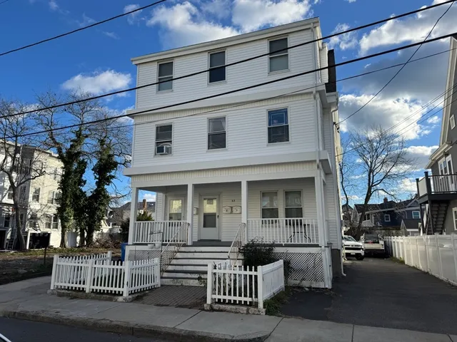 a view of a building with a porch