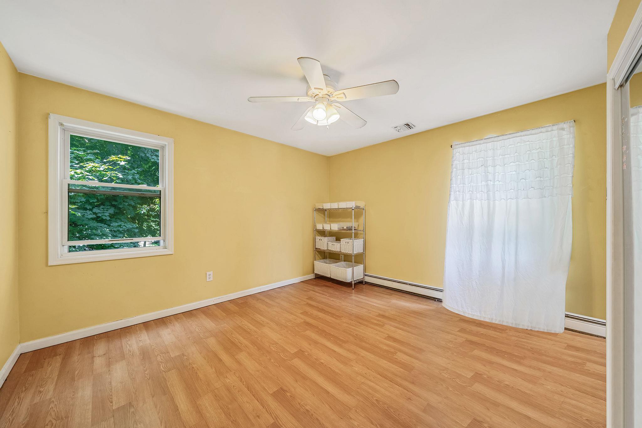 4 Ariel Court Rocky Point, NY 11778 - Photo 29 of 45 a view of an empty room with a window