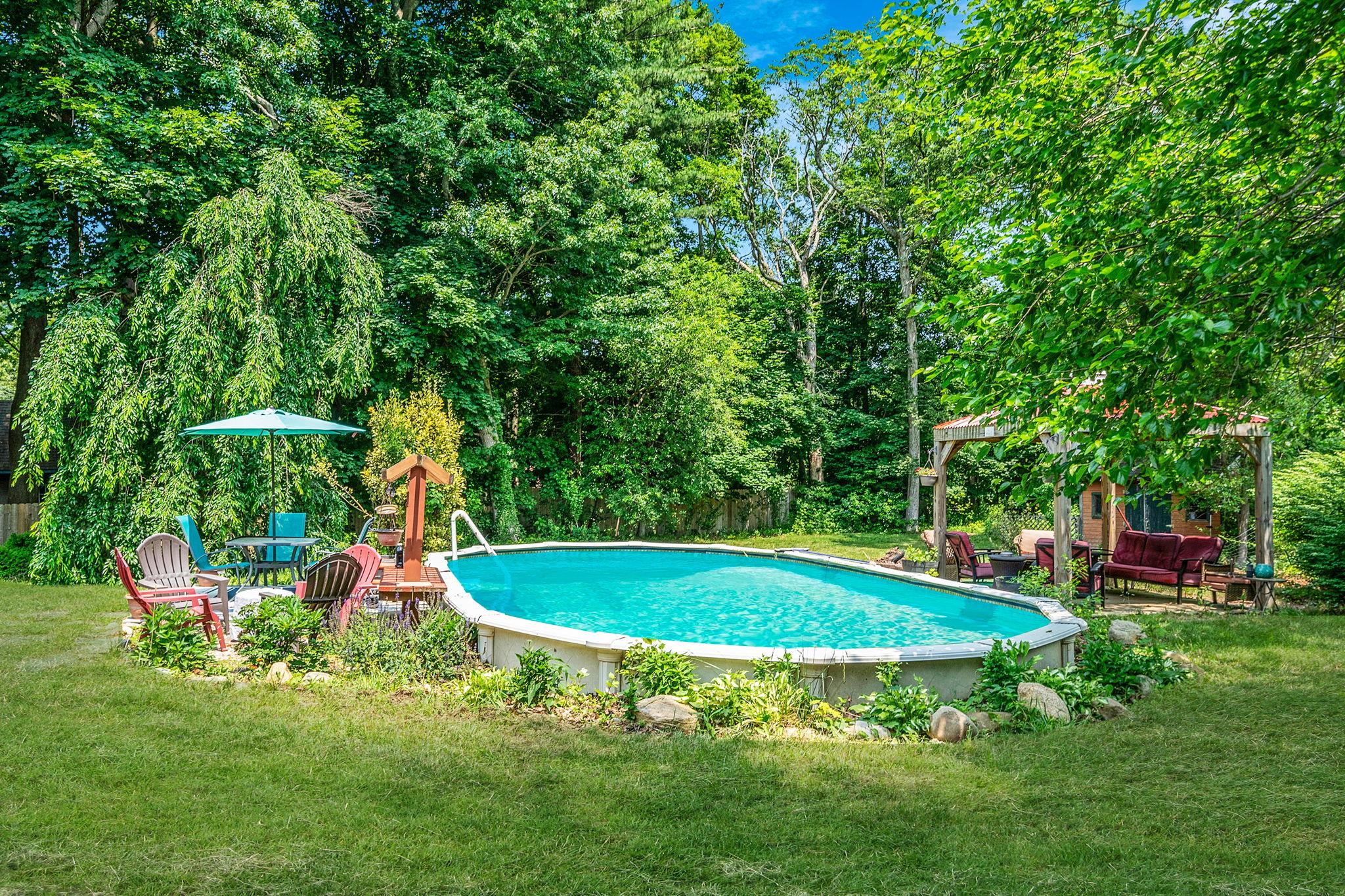 4 Ariel Court Rocky Point, NY 11778 - Photo 40 of 45 a view of a backyard with swimming pool