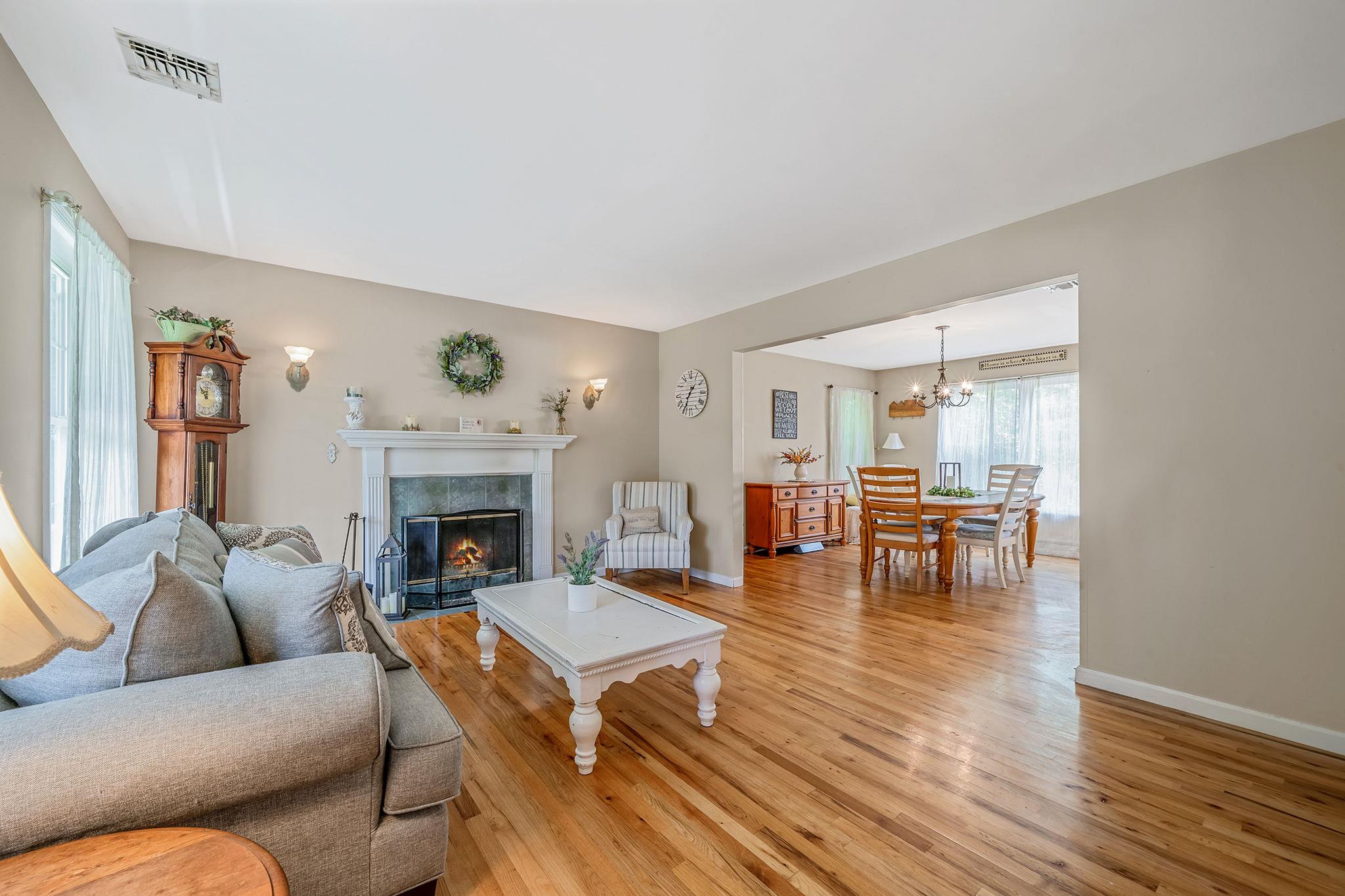 4 Ariel Court Rocky Point, NY 11778 - Photo 8 of 45 a living room with furniture and a fireplace