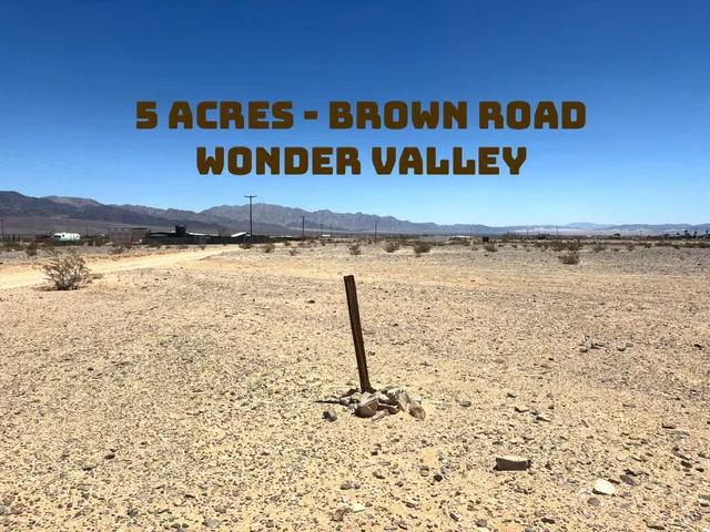 a view of a street with an ocean view
