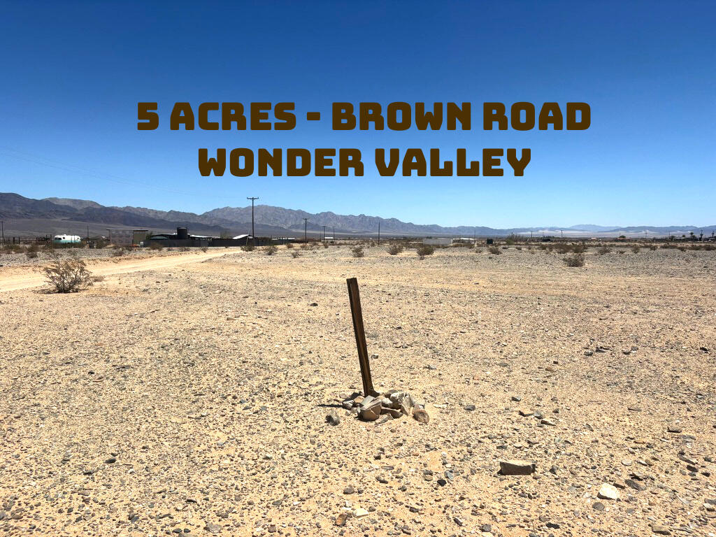 a view of a street with an ocean view