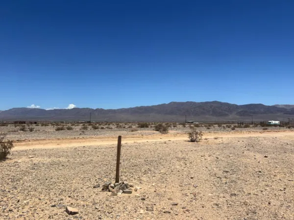 a view of lake with mountain
