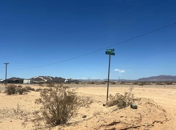 a view of a large body of water with water fall