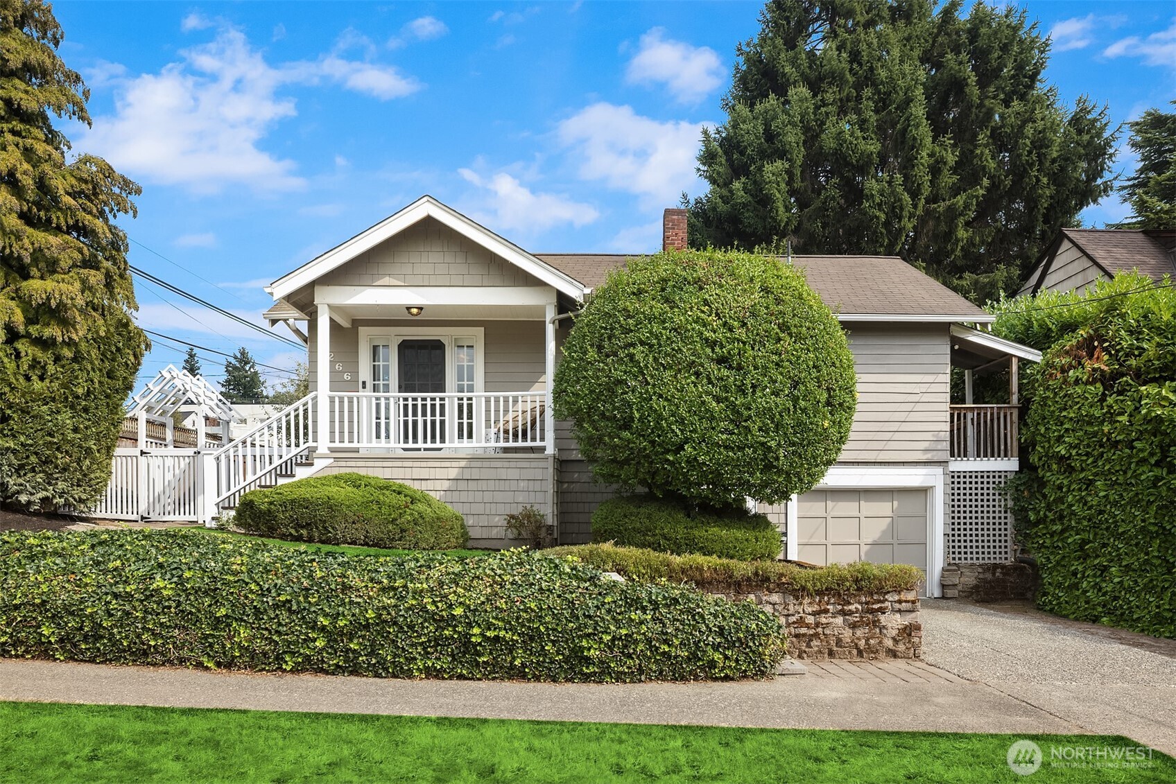 front view of a house with a yard