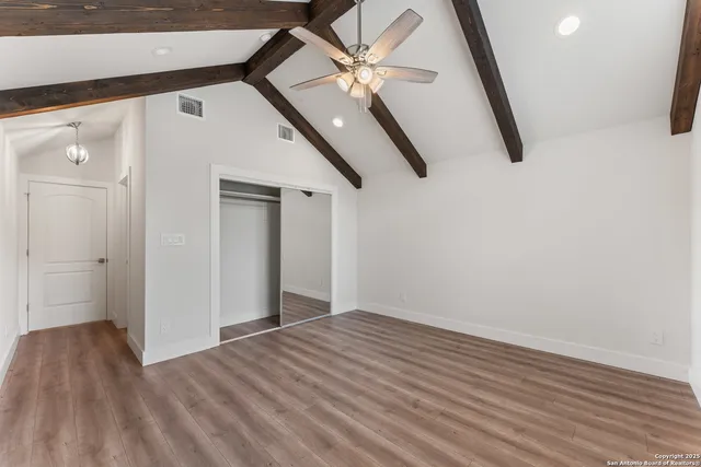 a bed room with a bed furniture and a window