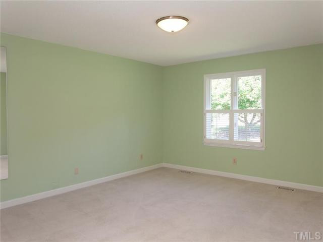 6109 Dodsworth Drive Raleigh, NC 27612 - Photo 5 of 21 Sunny and bright first bedroom.