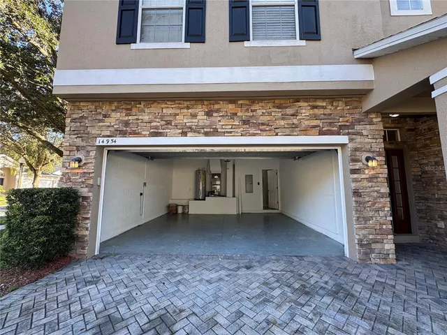 a view of a utility room with closet