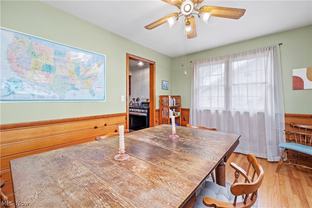 324 Erie Road Vermilion, OH 44089 - Photo 26 of 36 Dining room with hardwood / wood-style flooring and ceiling fan