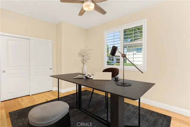 a view of a workspace with furniture