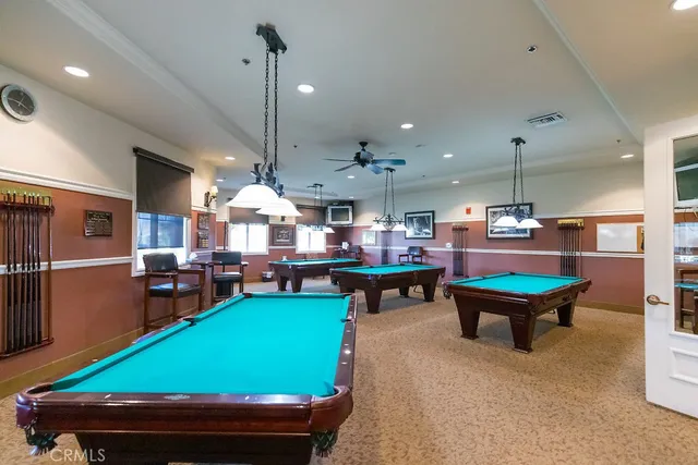 a kitchen with a stove and cabinets