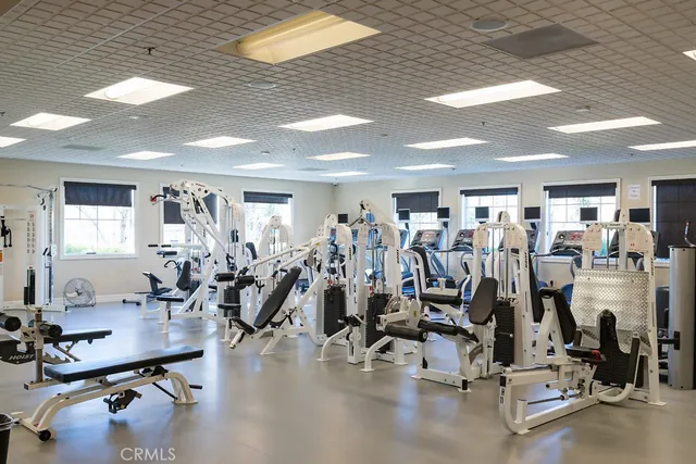 an aerial view of a houses with yard