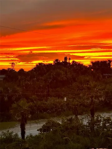 a view of ocean and mountain