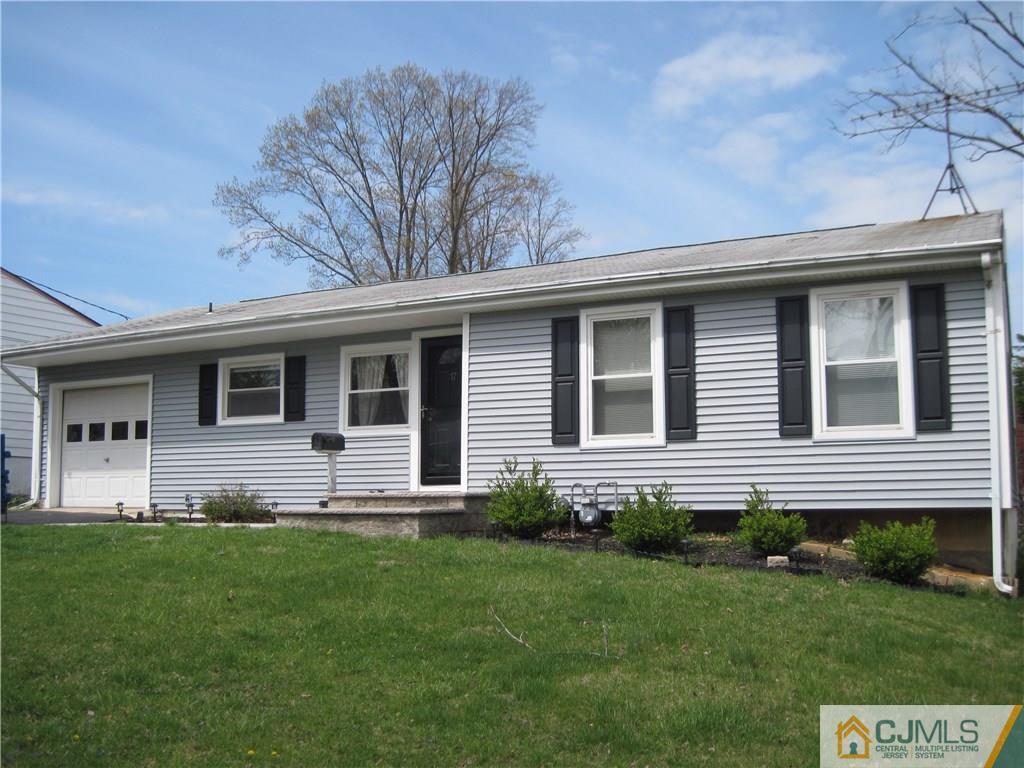 17 Georgetown Road Old Bridge, NJ 08859 - Photo 1 of 12 a house view with a garden space