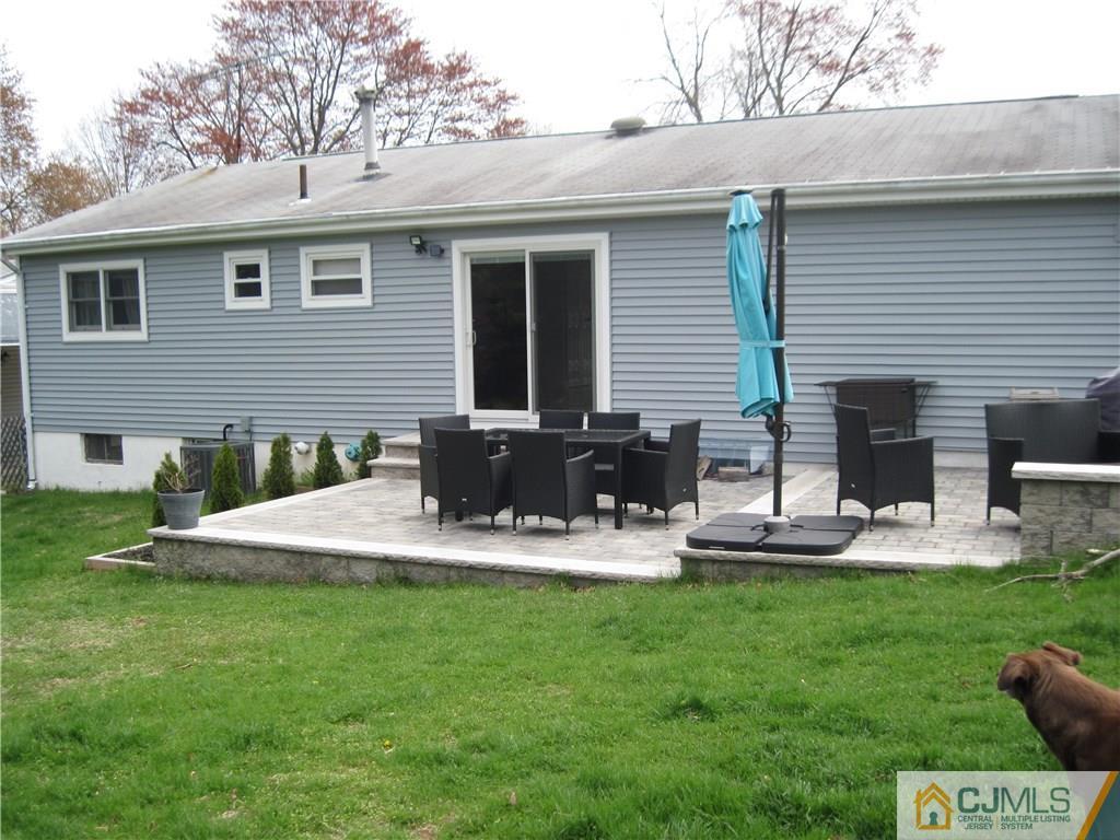 17 Georgetown Road Old Bridge, NJ 08859 - Photo 7 of 12 a view of a house with backyard and sitting area