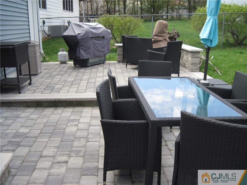 17 Georgetown Road Old Bridge, NJ 08859 - Photo 8 of 12 a view of a patio with table and chairs