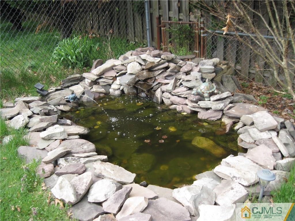 17 Georgetown Road Old Bridge, NJ 08859 - Photo 10 of 12 a backyard of a house with lots of green space