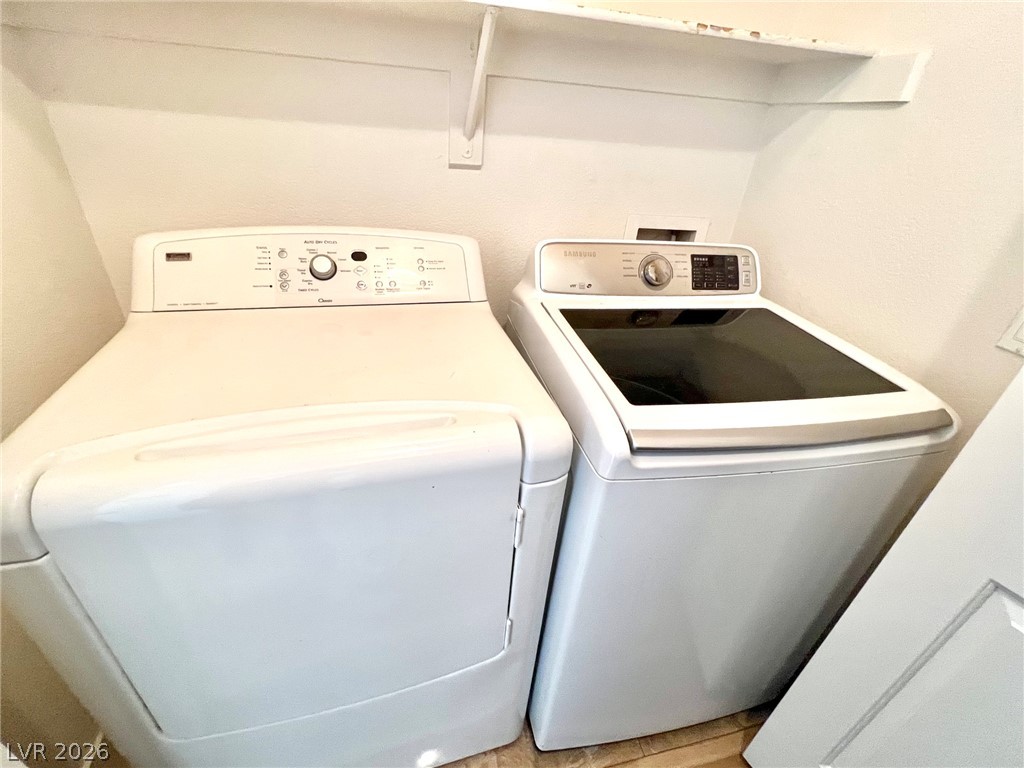 9708 Ridge Creek Place Las Vegas, NV 89134 - Photo 22 of 43 A dedicated space with efficient appliances, ready for your laundry needs.